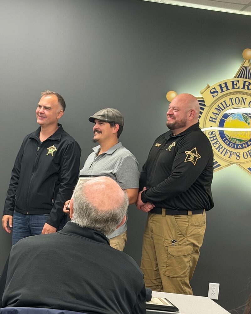 Tim Cortrecht with Sheriff Quakenbush and Deputy Bryan Melton at the Citizens Academy graduation.